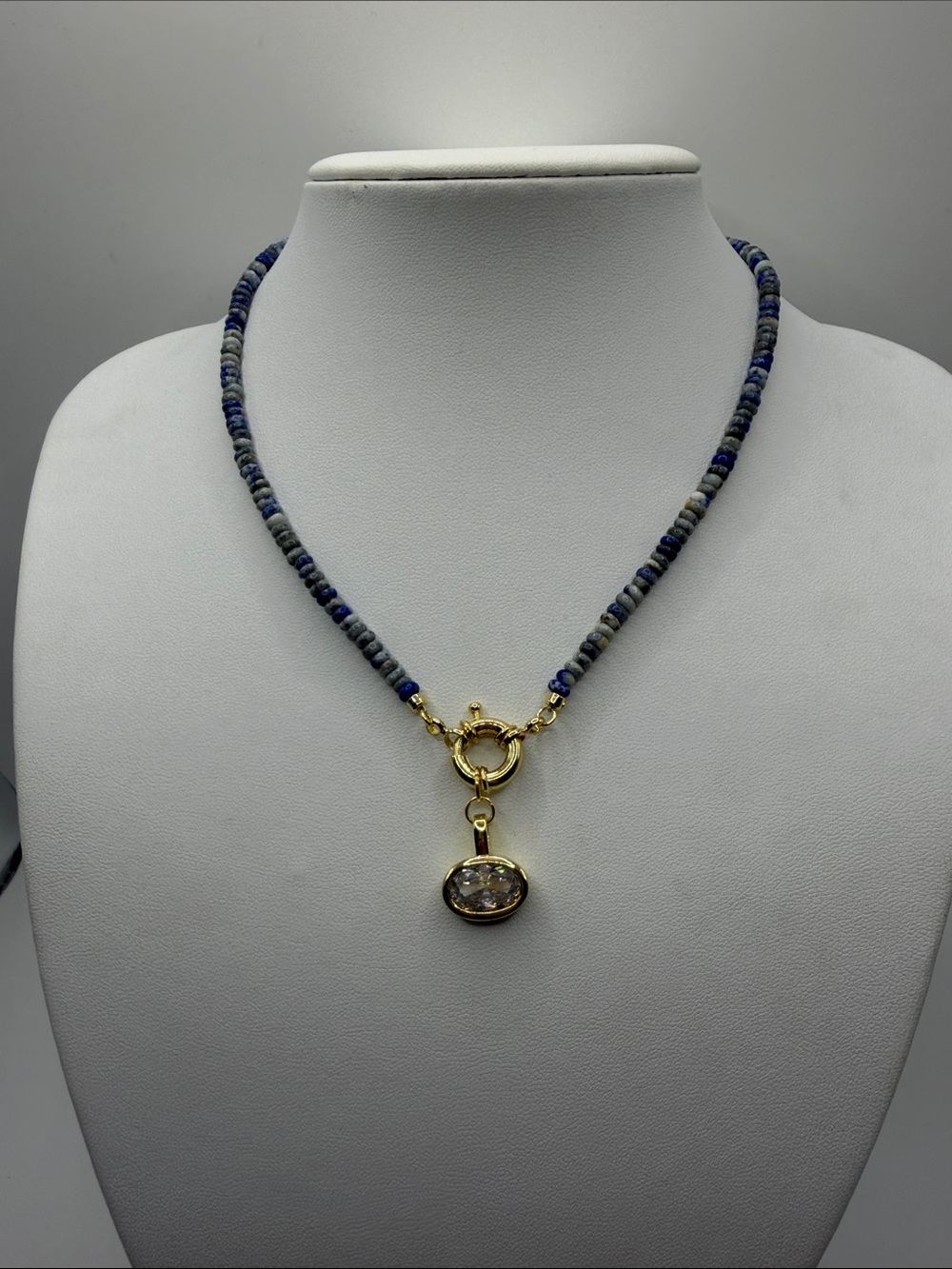 060. Blue Beaded Necklace with Gold & Crystal Pendant 16”